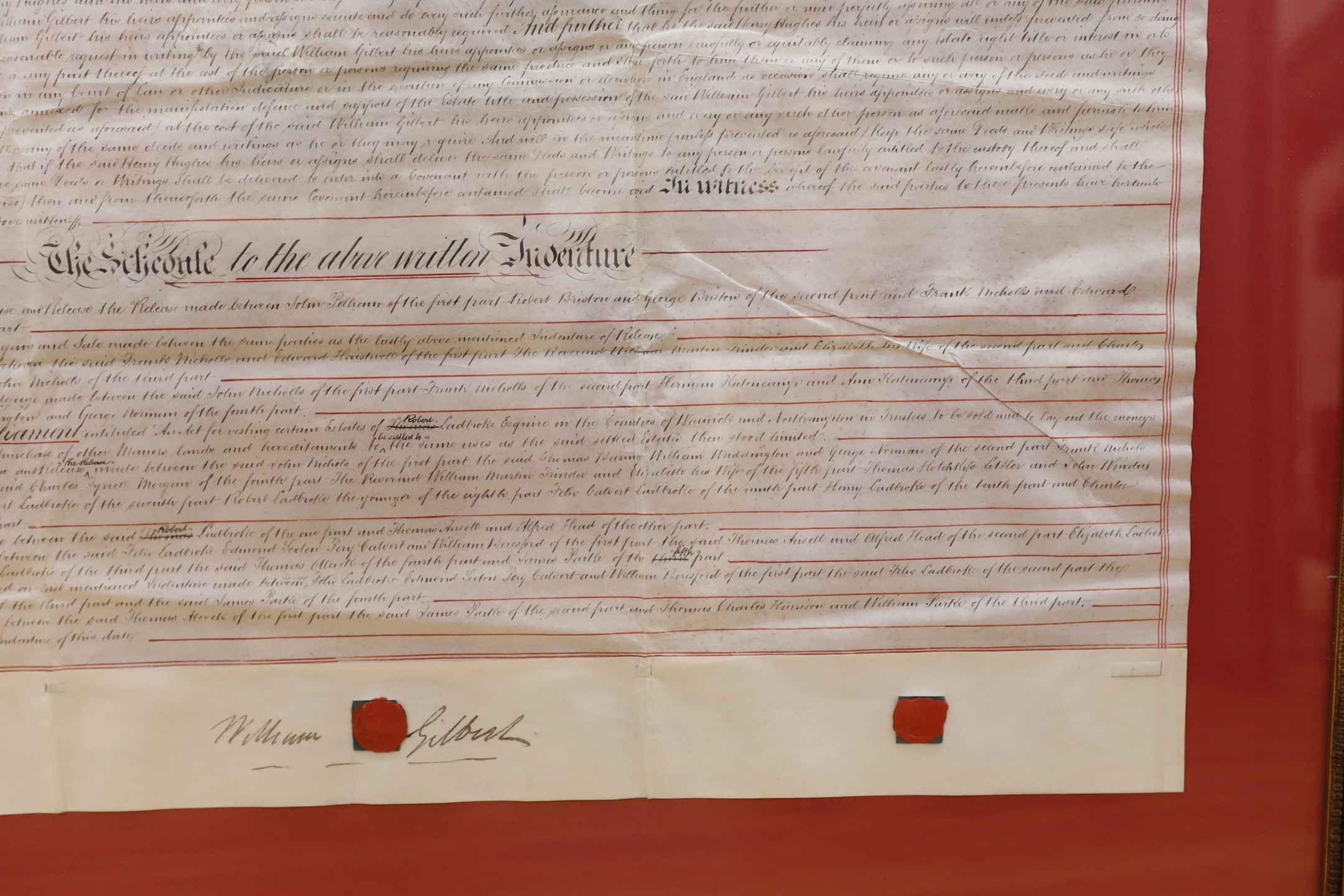 A framed 19th century indenture, for Henry Gilbert of Lingfield, 71 cms wide x 57 cms high.